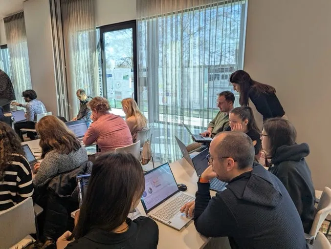 Scientific Community Building through Workshops: the NPLinker eScience experience