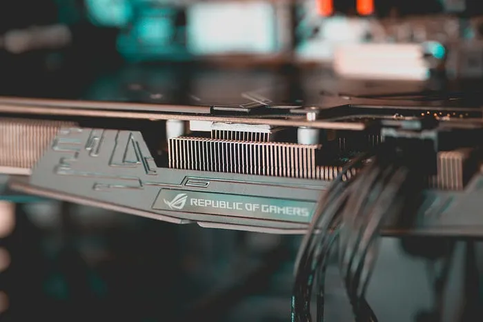 Use Julia to write code that runs on any GPU